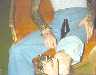 Gregg Allman Tattooing TattooNeil's leg.
